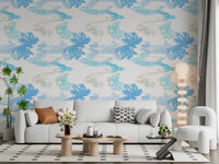 Living room styled with Fluid Serenity wallpaper in soft blue abstract waves