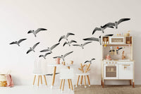 Minimalist mural with flying birds in landscape format

