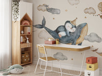 Whale and penguin nursery wall design

