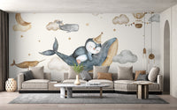 Whale and penguin nursery wall design
