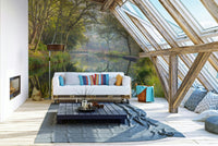 Trees with lush green leaves line the banks of the stream.

