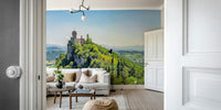 High angle vista overlooking rolling hills and a castle GD5061