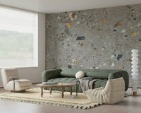Cool-toned Fossil Stone Grey wallpaper, scattered fragments add character to modern spaces.