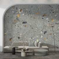 Elegant Fossil Stone Grey wallpaper, gritty concrete appearance, flecks of brown, cream.