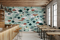 A graceful subtle pattern wall mural in cool, natural tones.