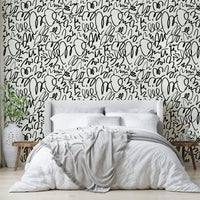 An interior with a fun and artistic accent wall


