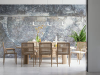 A hand applying the Frosted Slate realistic gray slate mural., GD6184