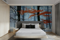 A bedroom decorated with a winter forest mural

