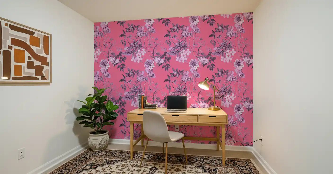 Bold botanical wallpaper with fuchsia tones and pale engraved flower detail