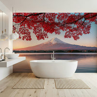 Scenic landscape wallpaper featuring a snow-capped peak and orange foliage.