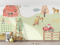 Farmyard tractor parked beside wooden fence