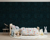 Bedroom using Galactic Star Field Petrol Wallpaper on a dark accent wall