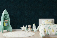 Fine gold dots define this Galactic Star Field Petrol Wallpaper design