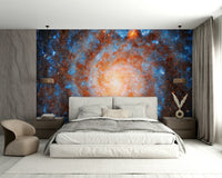 A wall mural of a galactic swirl.

