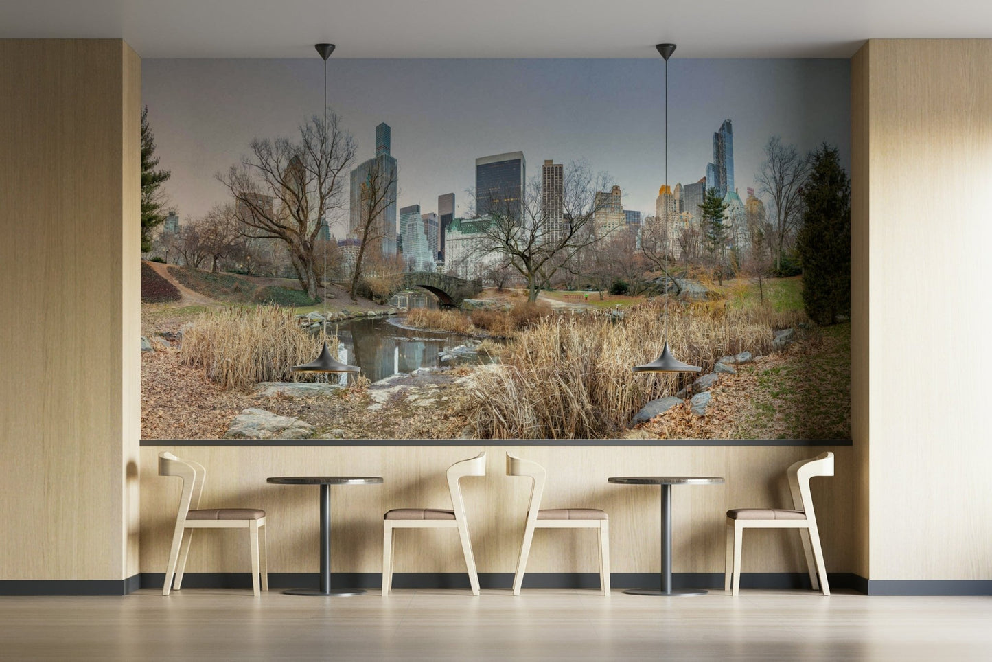 The ground is covered in dry brown leaves and grass.

