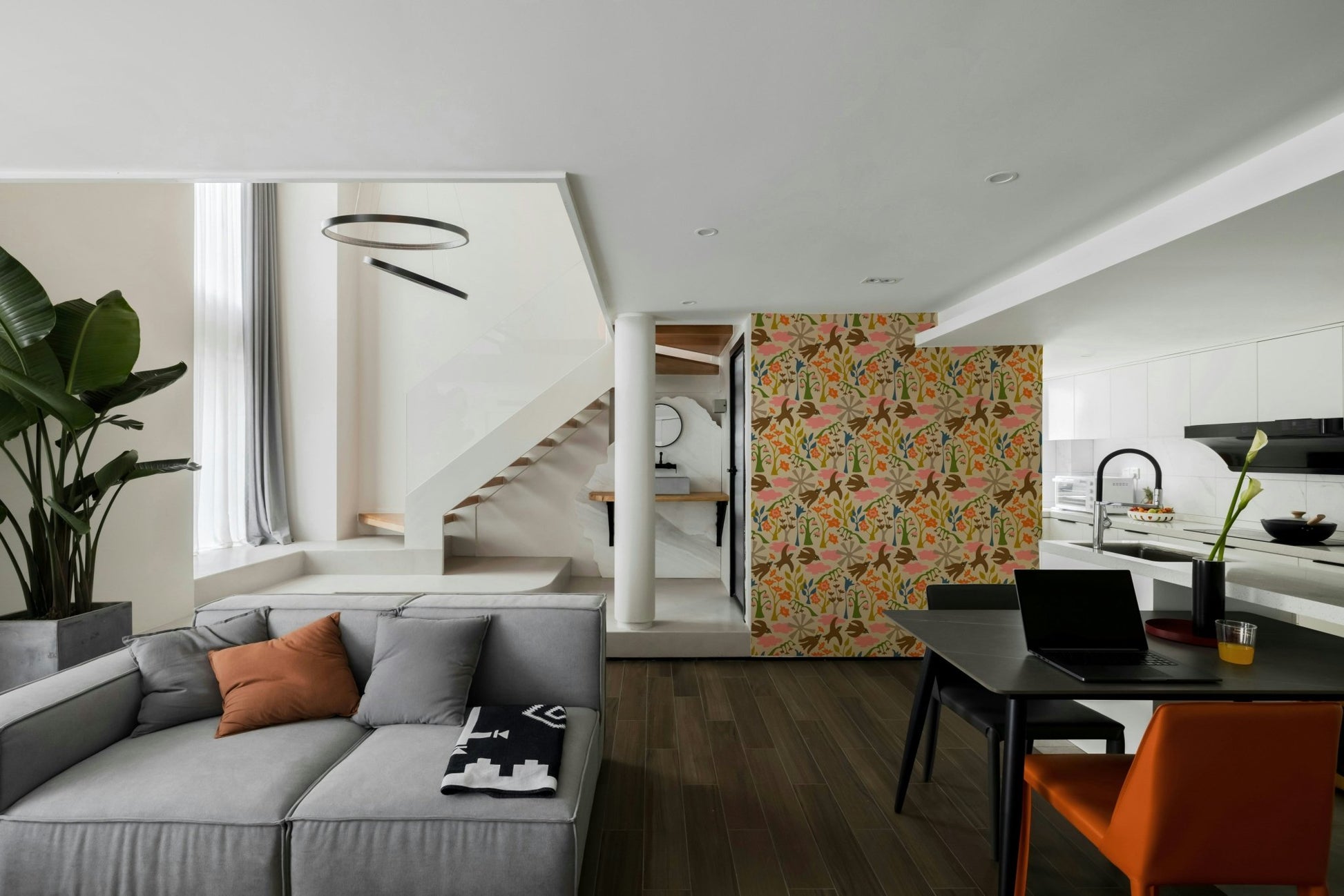 Earthy floral wallpaper with pink, orange, and green hues

