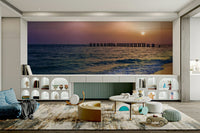 Radiant sky mural with soft waves and glowing sun.


