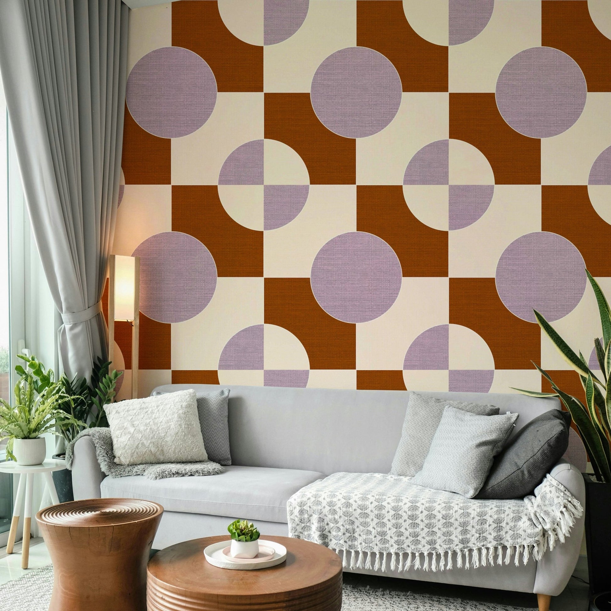 Living room accent wall with graphic geometric wallpaper

