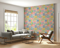 Graphic ABC wall covering; whimsical pastel colors.