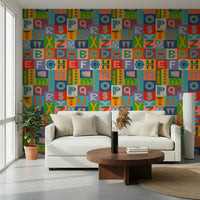 Modern graphic lettering on Retro Alphabet Rainbow Wallpaper accent wall.
