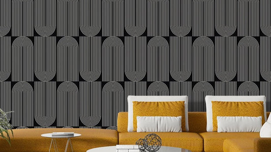 An angled shot of a wall with abstract wallpaper

