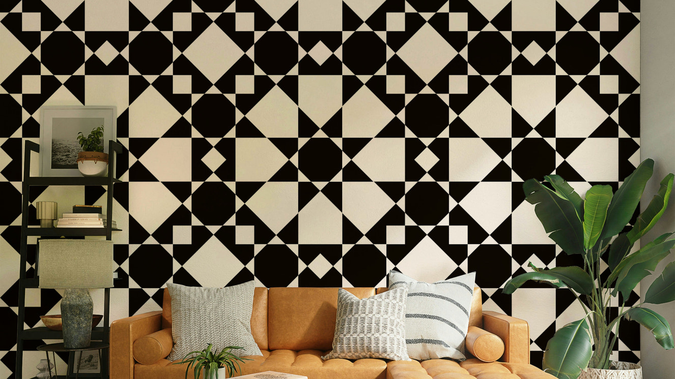 Geometric star wallpaper on a living room wall

