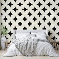 Geometric stars wallpaper on a living room wall

