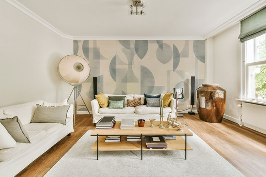 A full-wall mural of a modern, geometric pattern.
