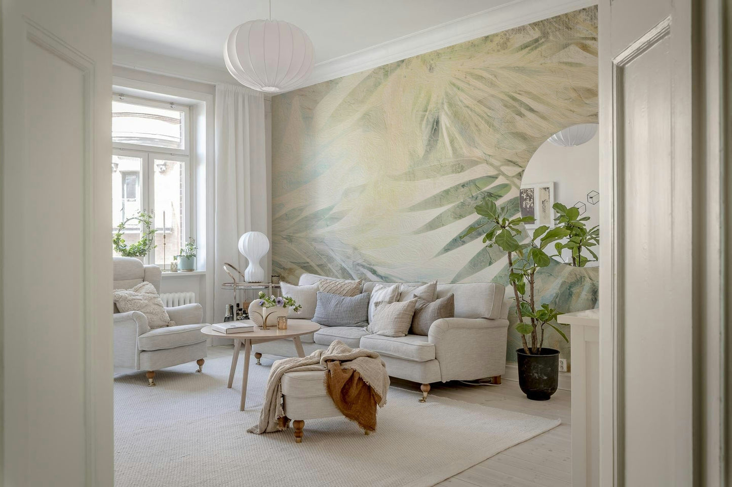 A calming foliage design wallpaper mural that defines a space.