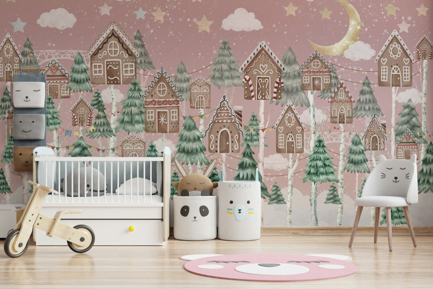 Snow is falling softly over the village and pine trees.

