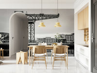 Glasgow's Giant Wall Mural as a backdrop for a leather sofa in a lounge.
