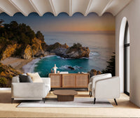 Patio-style lounge enriched by Golden Cove Wall Mural and a golden ocean horizon