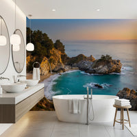 Bathroom transformed by Golden Cove Wall Mural and its dramatic seaside glow