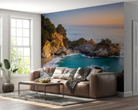 Living room brightened by Golden Cove Wall Mural and its calm coastal sunset view