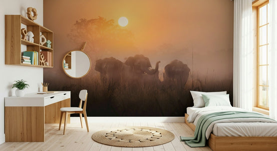 A beautiful golden dawn wallpaper mural featuring majestic elephants silhouetted against a sunrise., GD5860