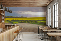 The sky is a mix of soft colors, like yellow, orange, and pink.

