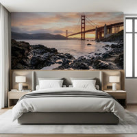 Warm peach skies wrap the bedroom in Golden Gate Bridge sunset wall mural detail.GD9532