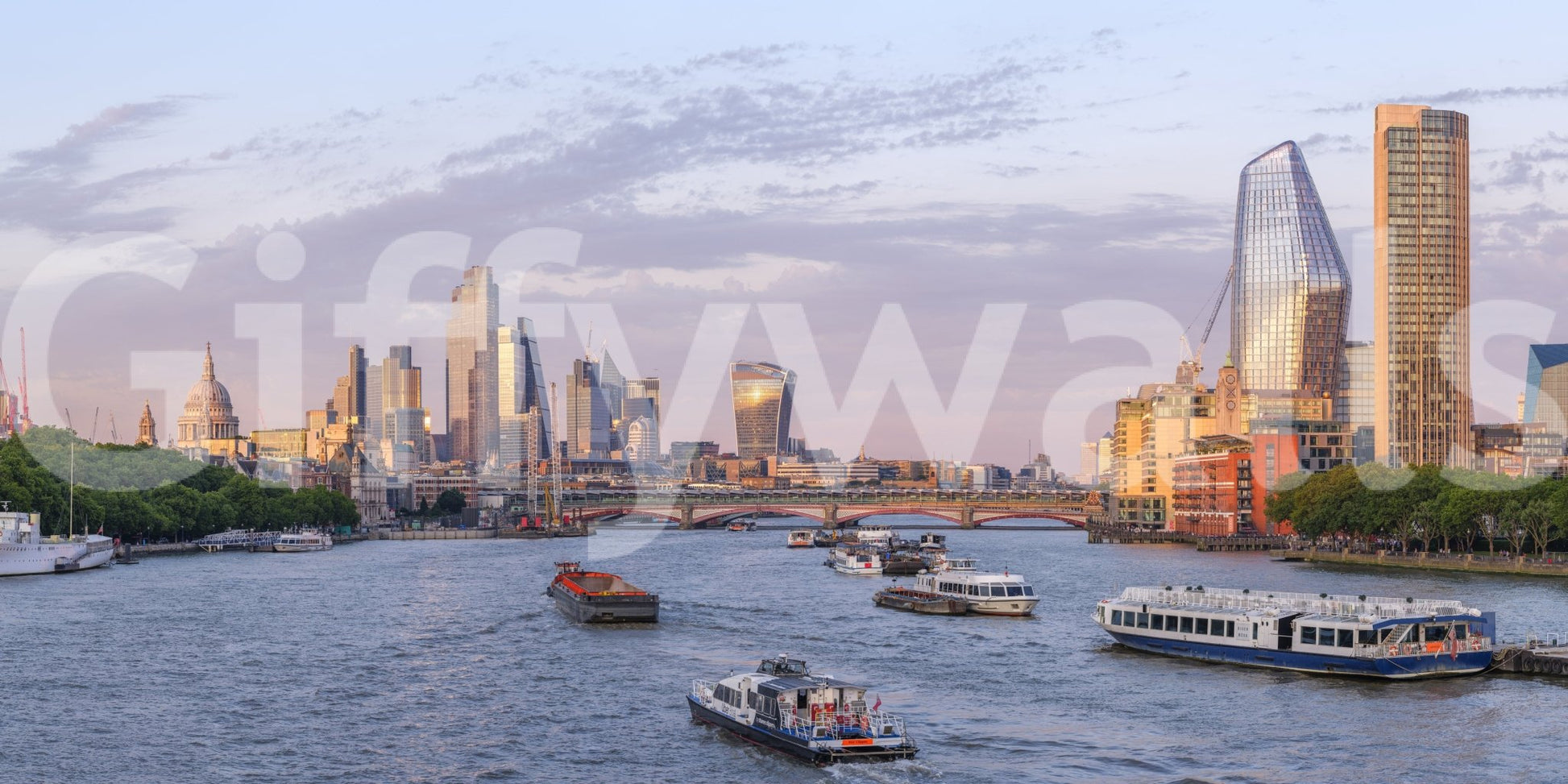 River traffic below Golden Hour on the Thames Wall Mural skyline in warm sunset tones