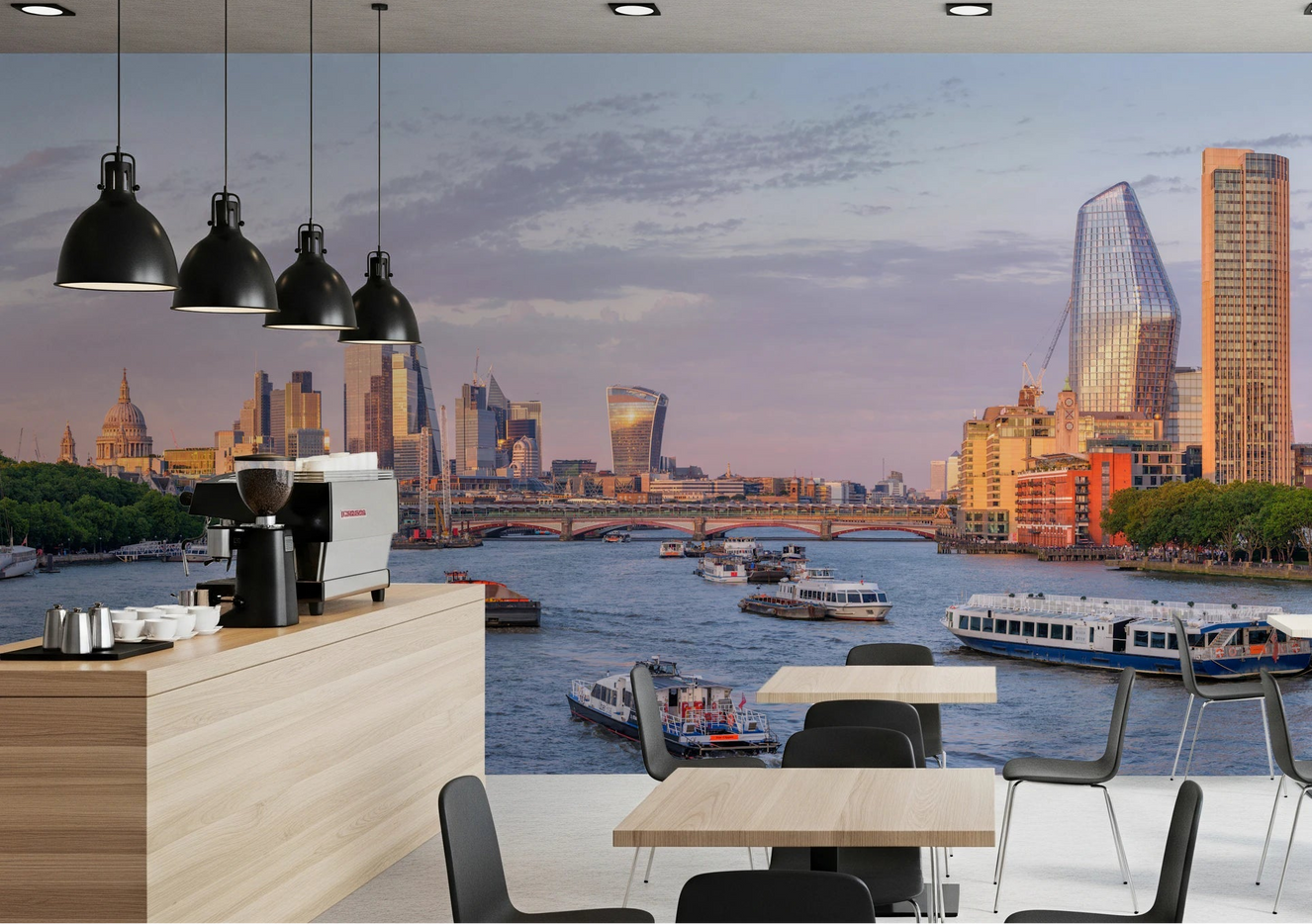 Cafe seating with Golden Hour on the Thames Wall Mural behind a riverside counter