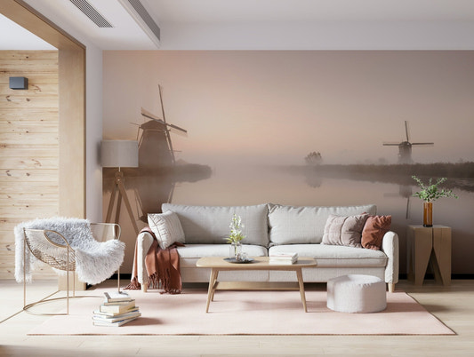 A beautiful golden hour windmill wallpaper mural over a scenic field.