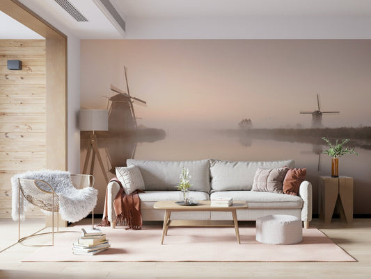 A beautiful golden hour windmill wallpaper mural over a scenic field.