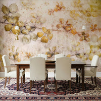 A graceful subtle leaf wall mural in soft, golden tones.