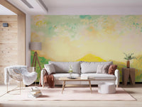 Quiet golden hues fill a relaxed living room behind this impressionist meadow wall mural.GD9594