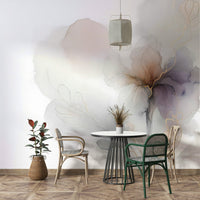 Nature-inspired mural with gold-outlined leaves.

