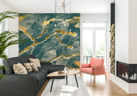 Golden Veins Deep Lagoon Marble accent wall behind a white sofa.