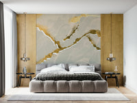 Golden Veins Ecru Sand Marble accent wall behind a white sofa.