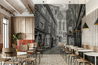 A peaceful stone archway mural on decorative wallpaper.

