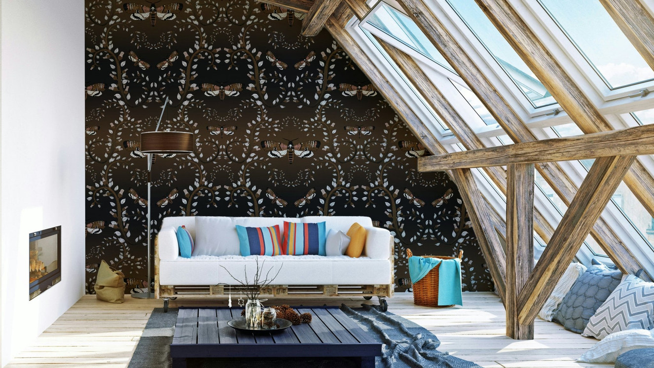 Earth-toned wallpaper with gothic moths and curling vines.

