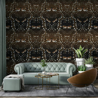 Earth-inspired wallpaper with insects and organic detailing.

