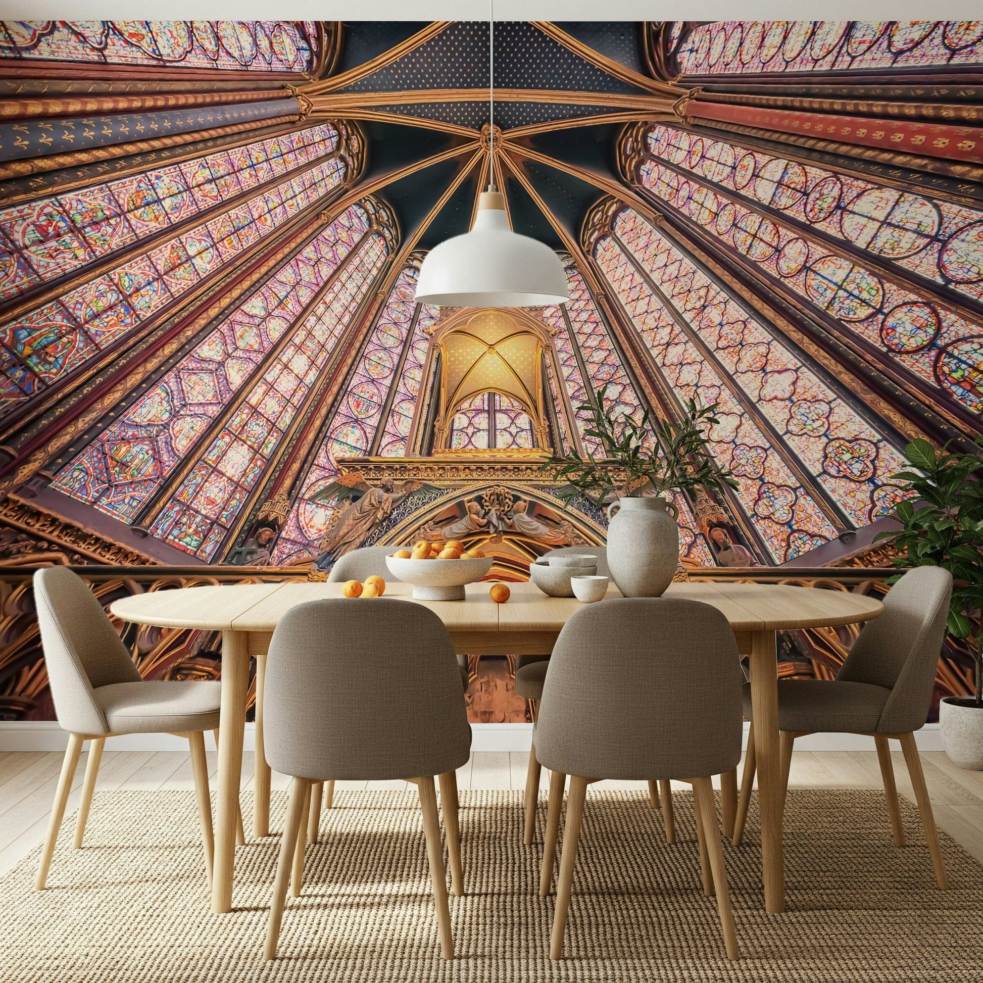 Dining room set against a stained-glass Gothic wall mural with rich vaulted detail